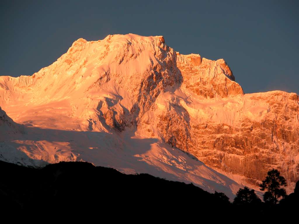 Manaslu 07 02 Ngadi Chuli Close Up Sunrise From Syala Wow! Midway between Manaslu and Himal Chuli, Ngadi Chuli (7871m, 20th highest mountain in the world, also known as Peak 29, Dakum, and Dunapurna) shone beautifully in the early morning light at sunrise. A possible first ascent was made in 1970 by Hiroshi Watanabe and Lhakpa Tsering. After being out of sight for two hours very near the summit, they reappeared and suffered a fatal fall. On May 8, 1979 Polish climbers Ryszard Gajewski and Maciej Pawlikowski made it to the summit via the West buttress.